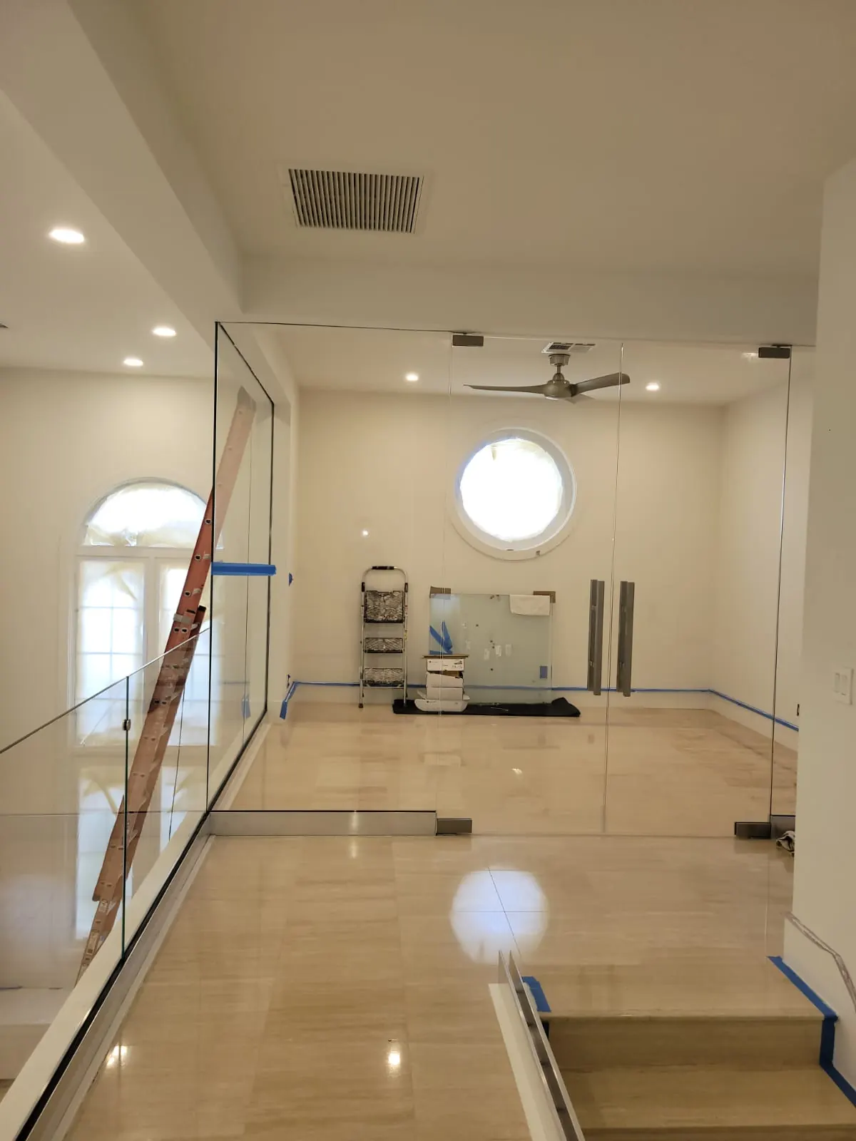 after office glass enclosure with chrome hardware in Southwest Florida