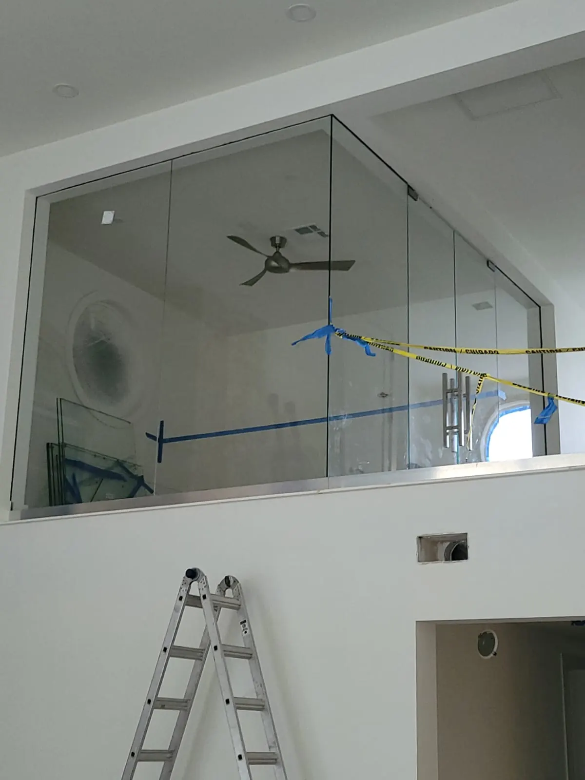 before office glass enclosure with chrome hardware in Southwest Florida