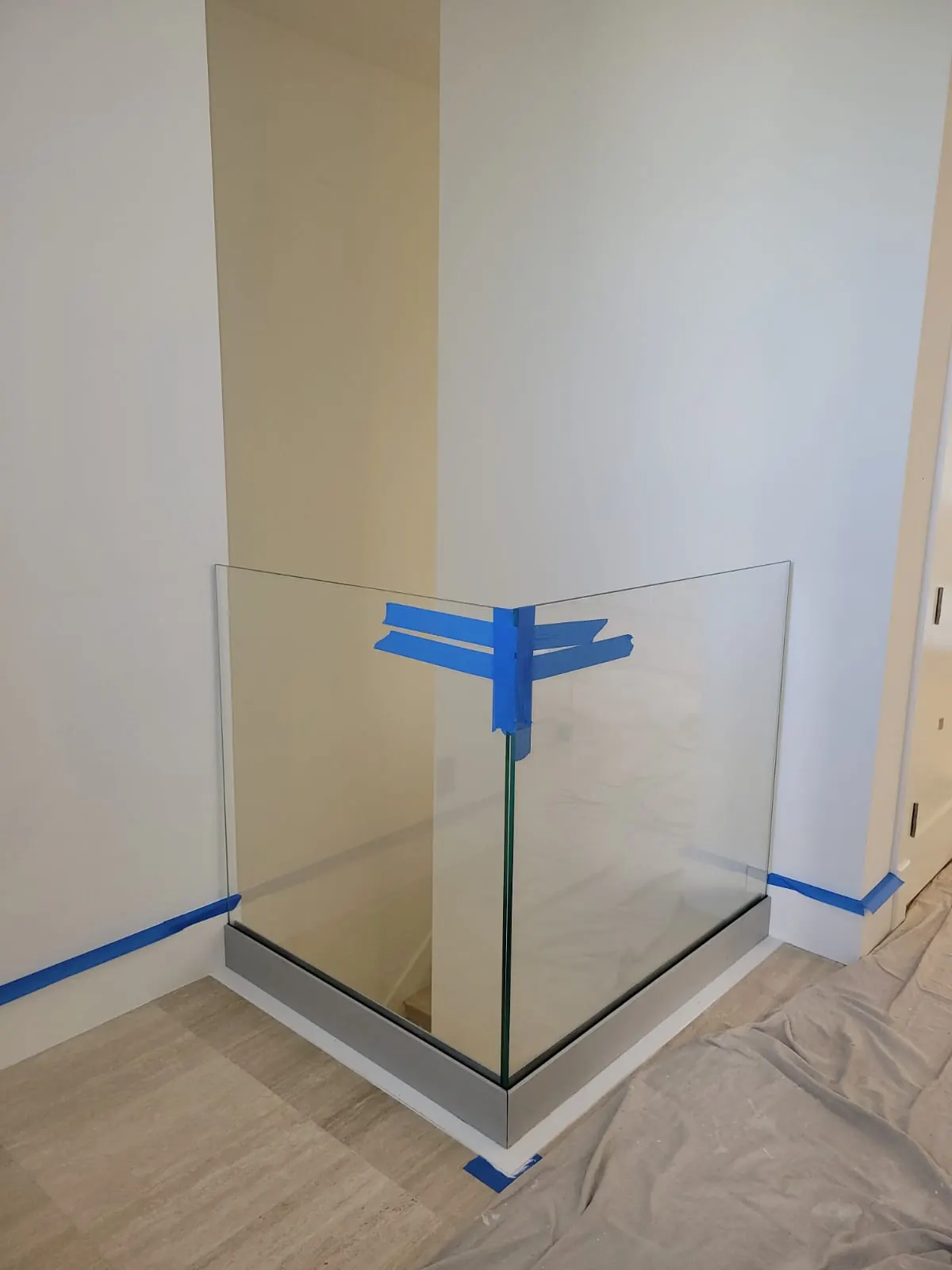 after clear glass railing with brushed nickel hardware in Southwest Florida
