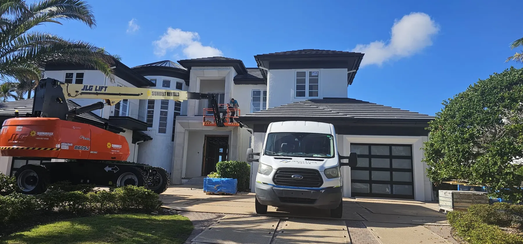 after ultra clear glass railing with black hardware in Southwest Florida