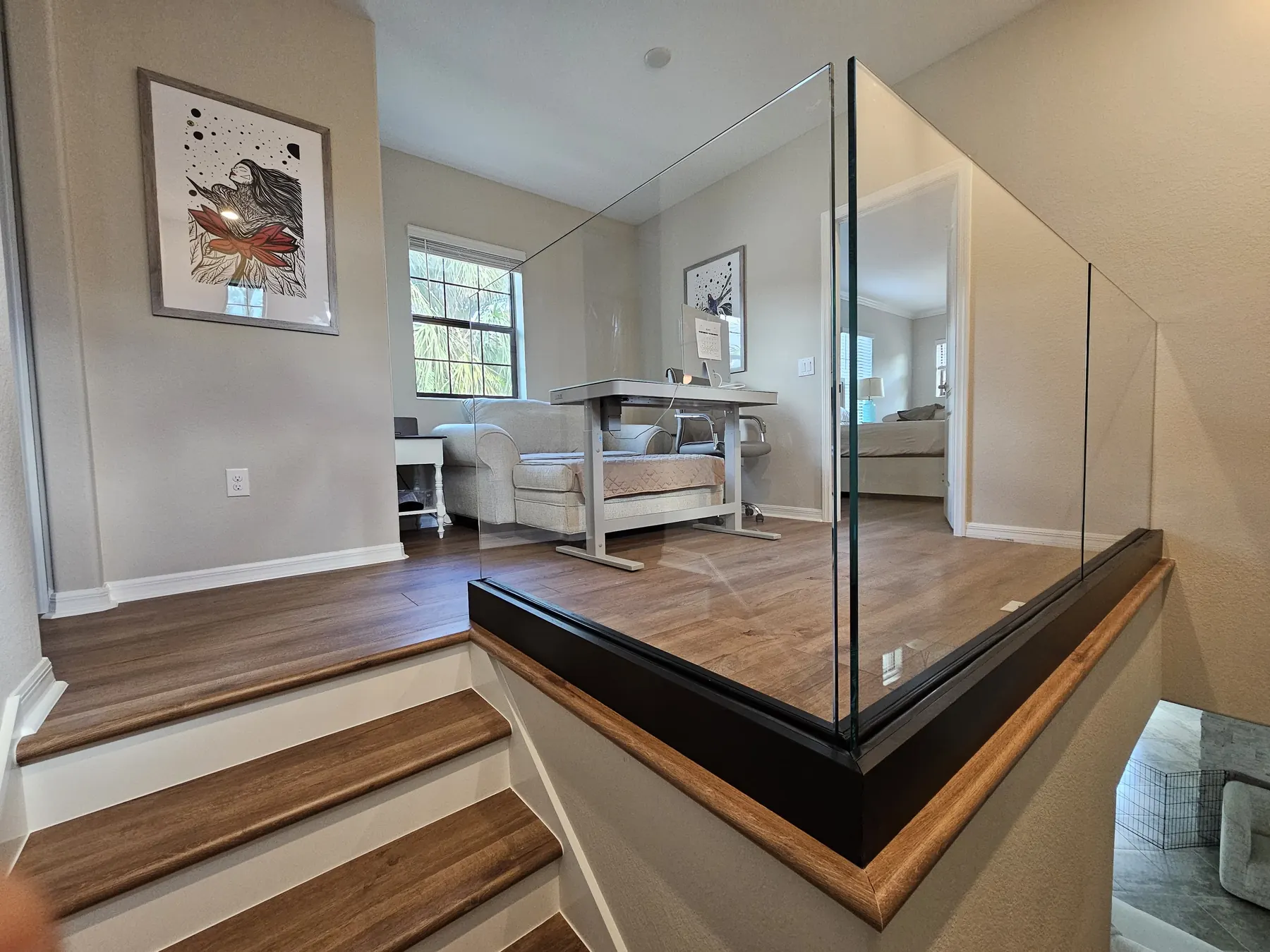 after ultra clear glass railing with black hardware in Southwest Florida