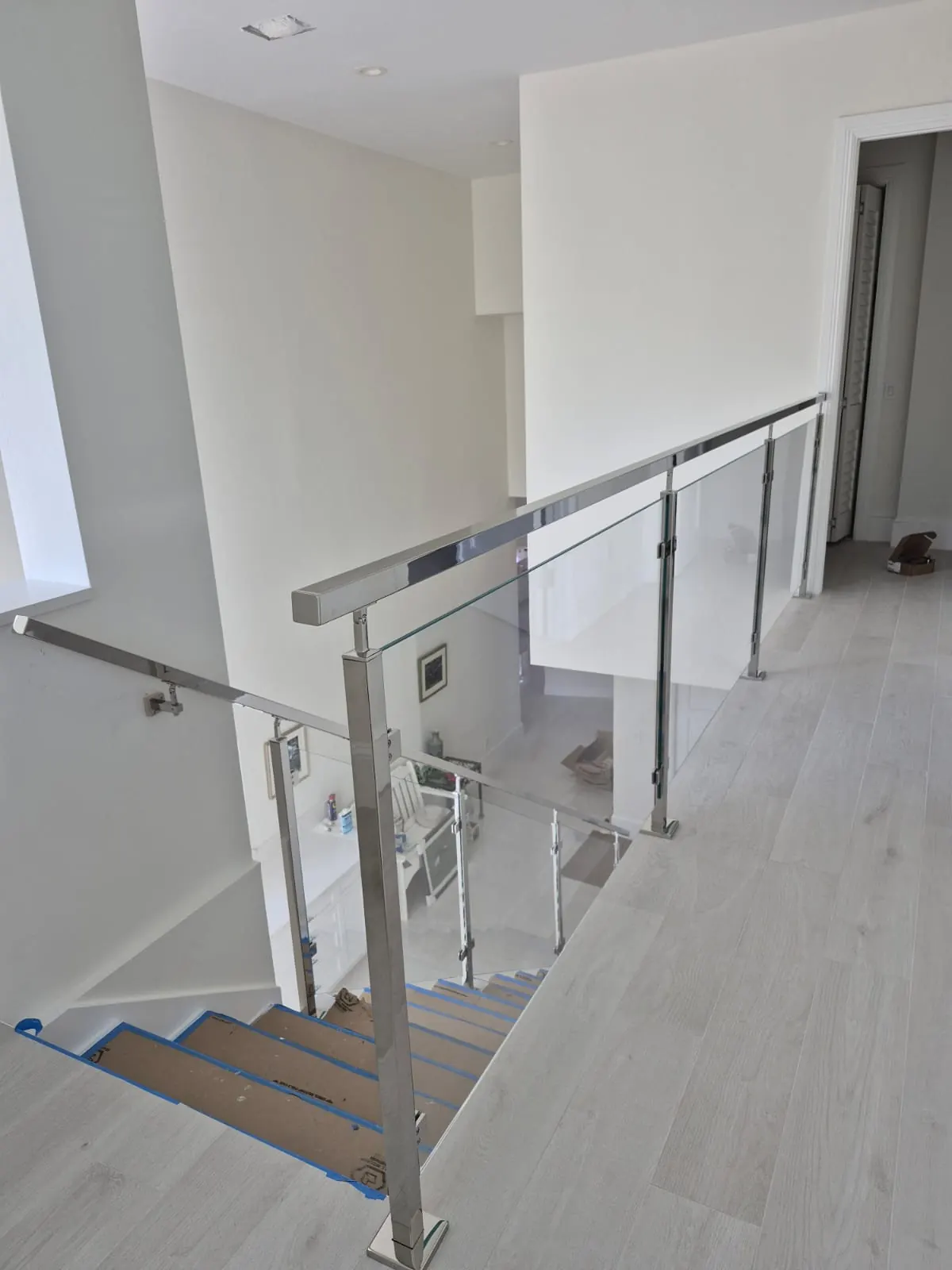 after ultra clear glass railing with chrome hardware in Southwest Florida