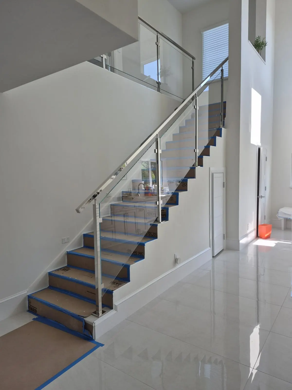 after ultra clear glass railing with chrome hardware in Southwest Florida