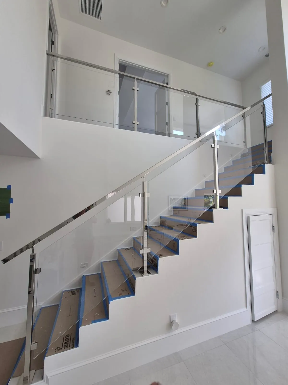 after ultra clear glass railing with chrome hardware in Southwest Florida