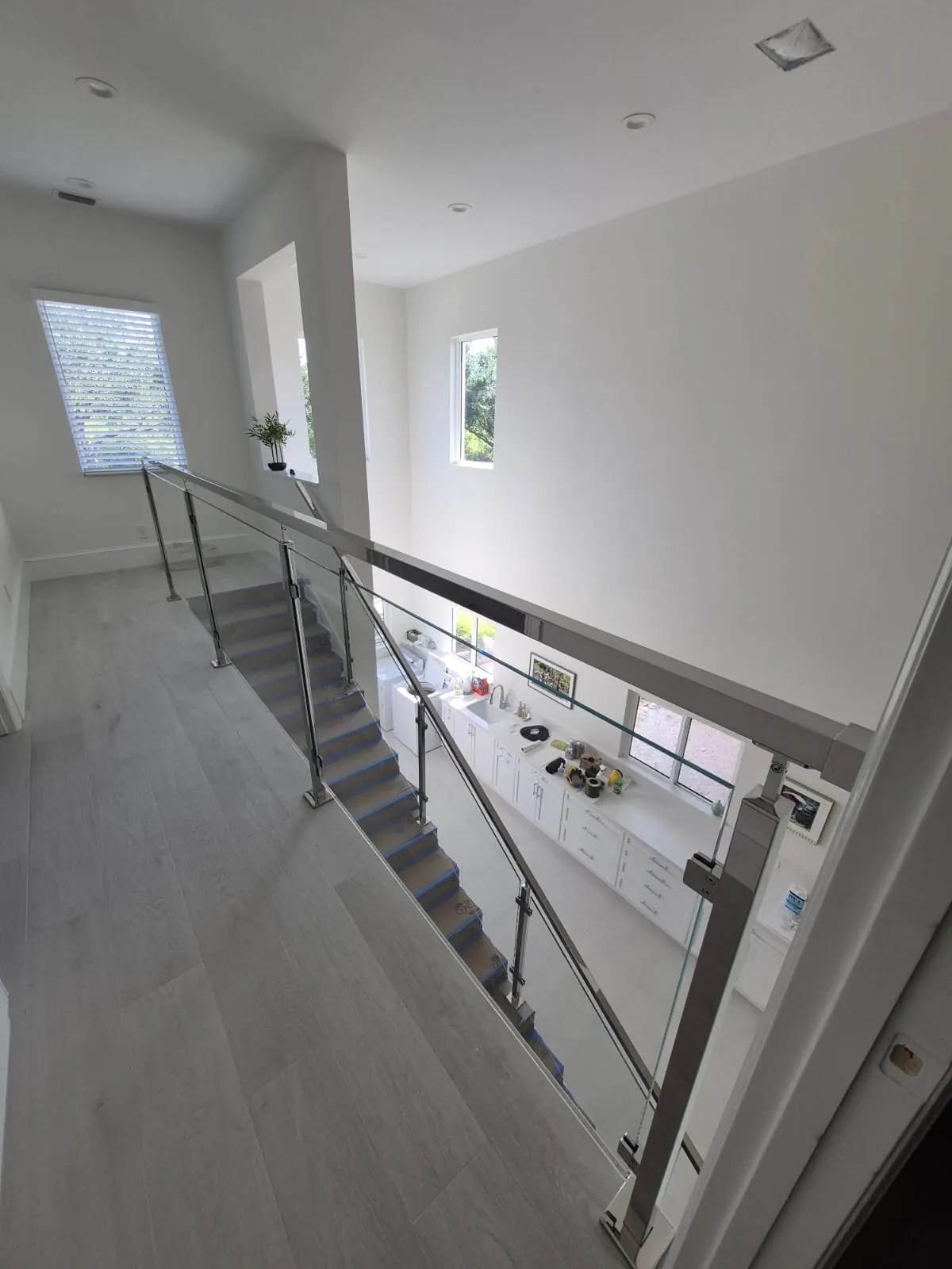 after ultra clear glass railing with chrome hardware in Southwest Florida
