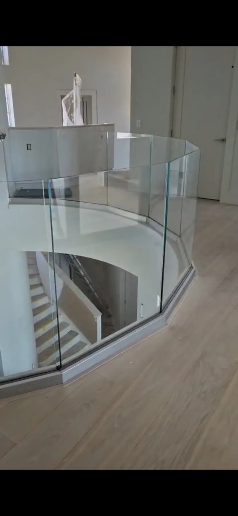 after ultra clear glass railing with brushed nickel hardware in Southwest Florida