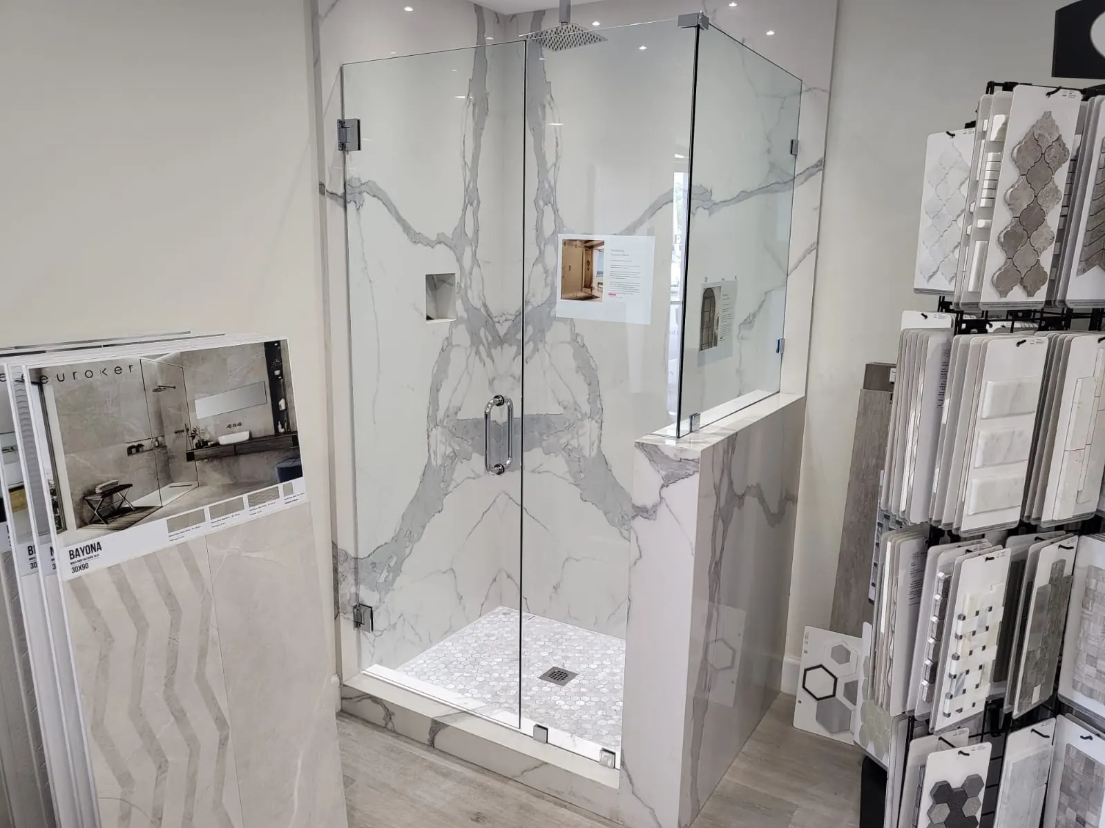 after frameless swing shower glass with chrome hardware in Southwest Florida