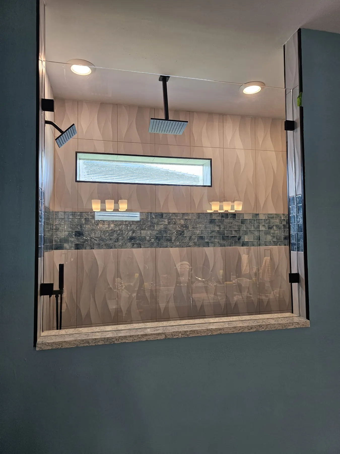 after frameless shower glass with black hardware in Southwest Florida