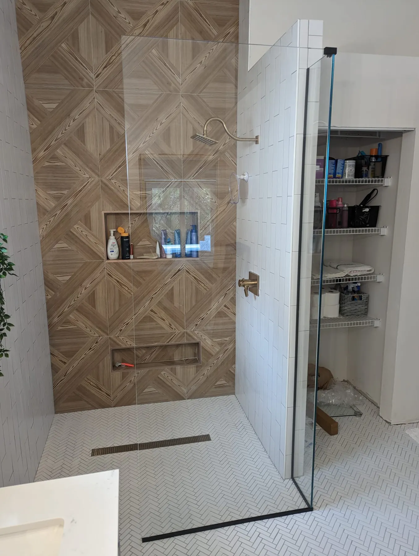 after frameless shower glass with black hardware in Southwest Florida