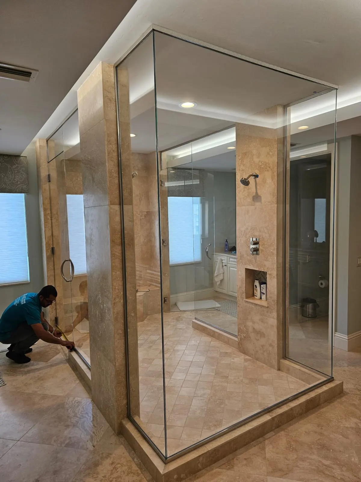 after frameless swing shower glass with chrome hardware in Southwest Florida