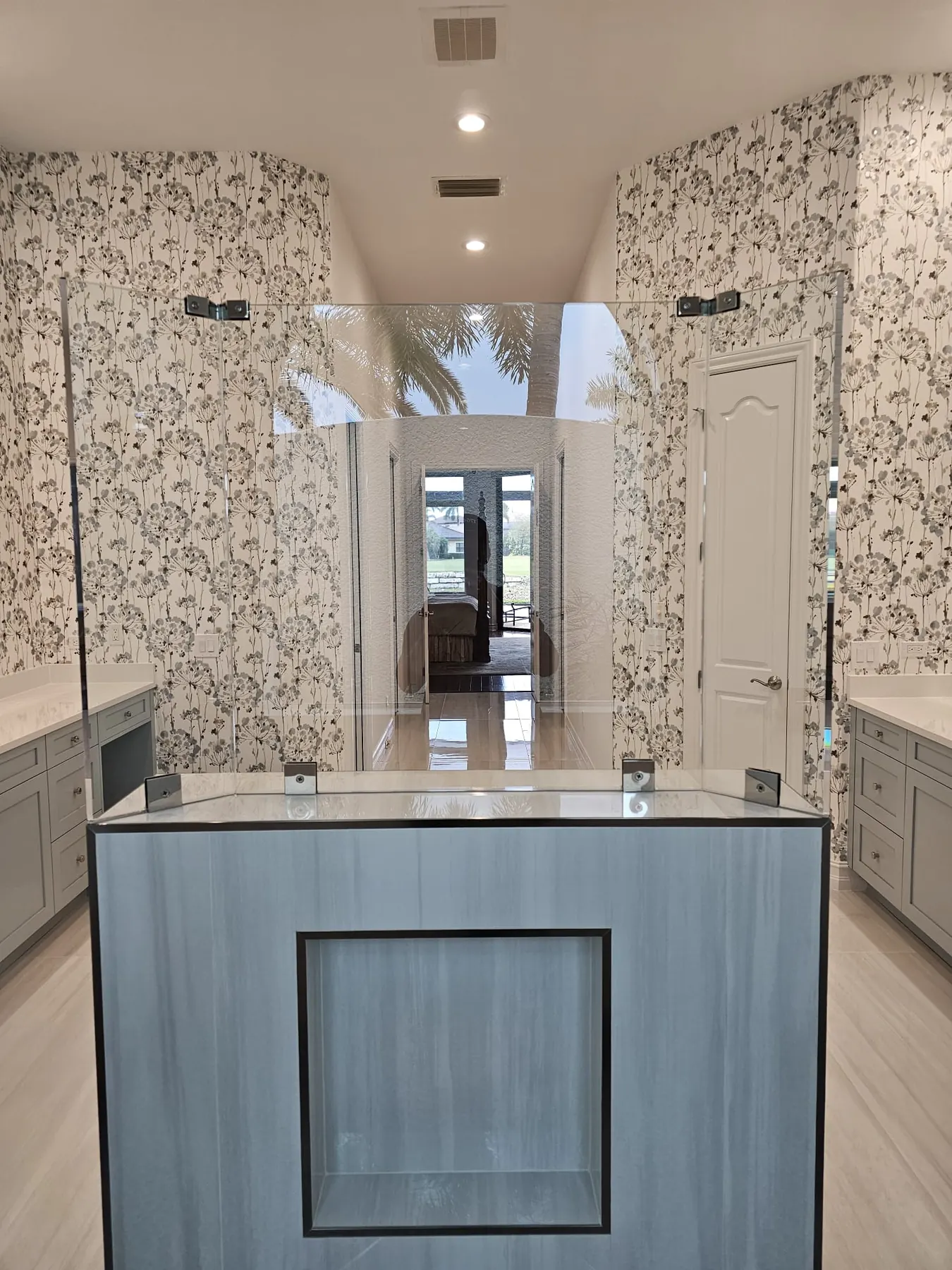 after frameless shower glass with chrome hardware in Southwest Florida