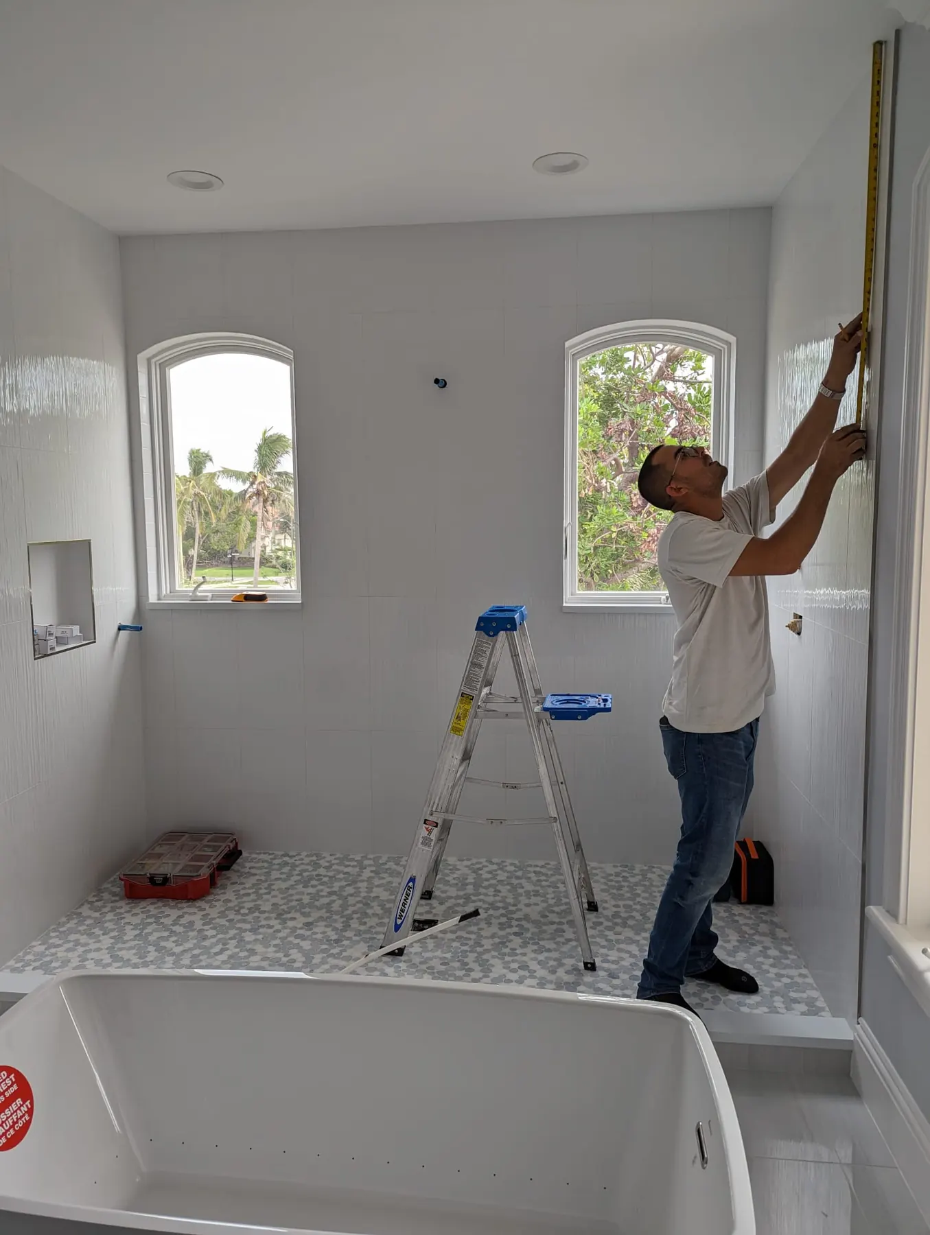 before frameless shower glass with chrome hardware in Southwest Florida