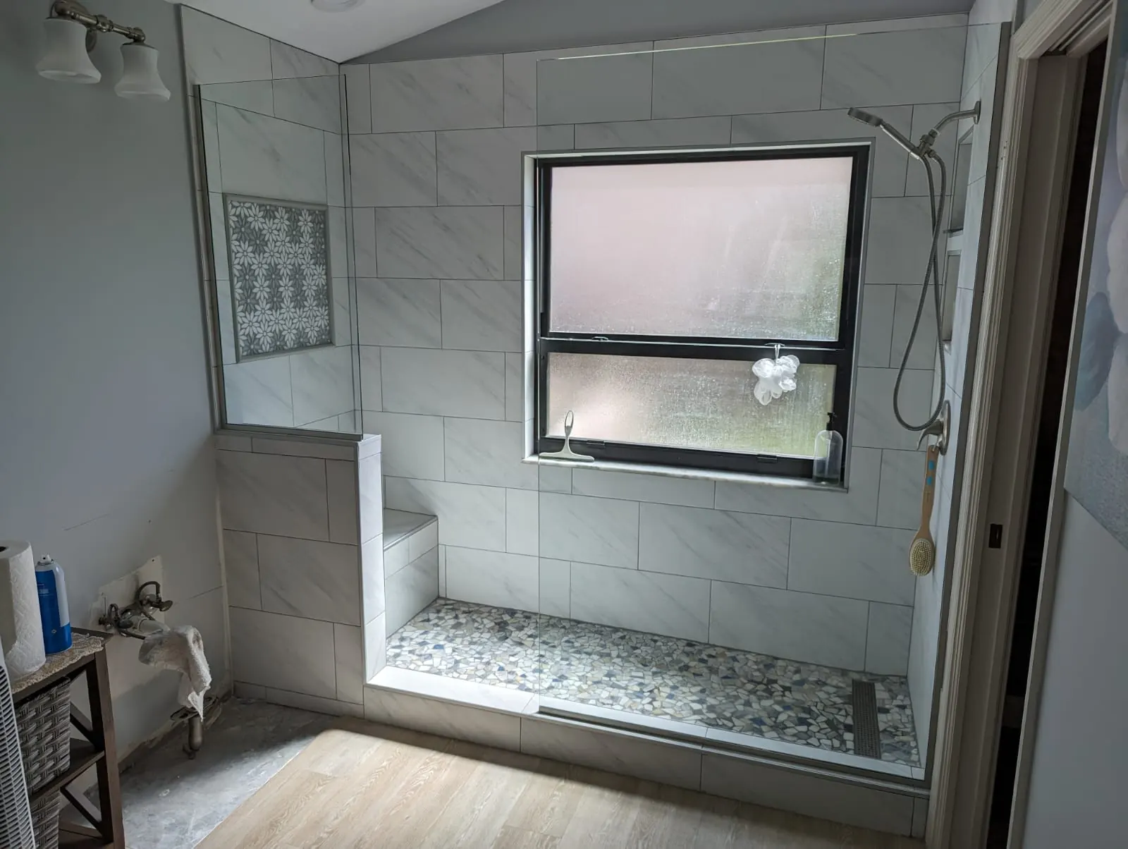 after frameless shower glass with brushed nickel hardware in Southwest Florida